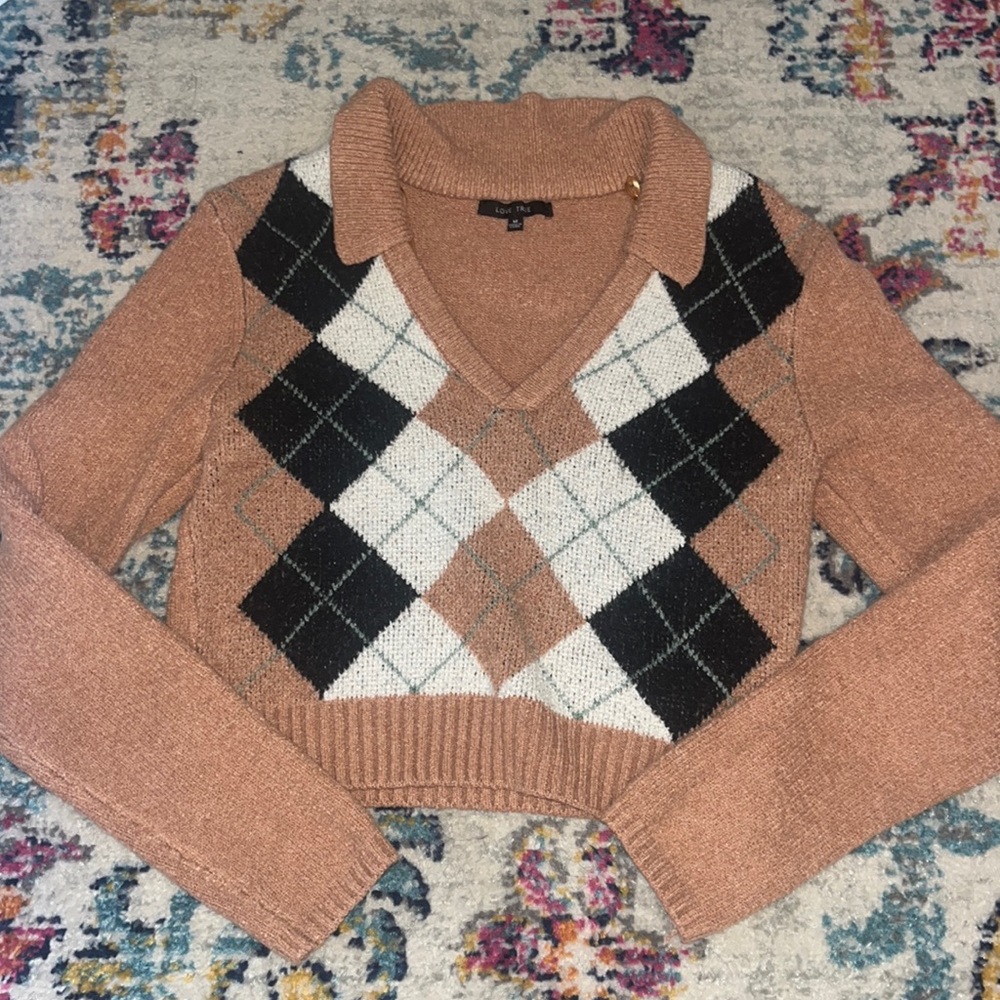 Cute long sleeve sweater. Size M from love tree brand